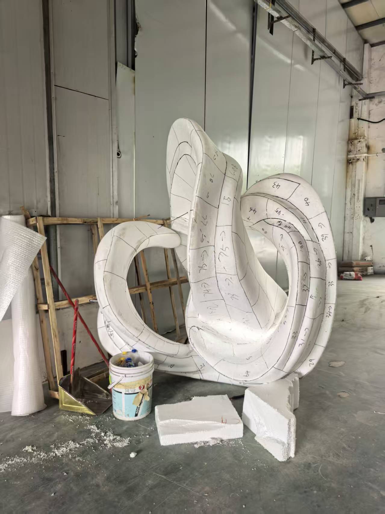 Custom sculptural FRP form in production.