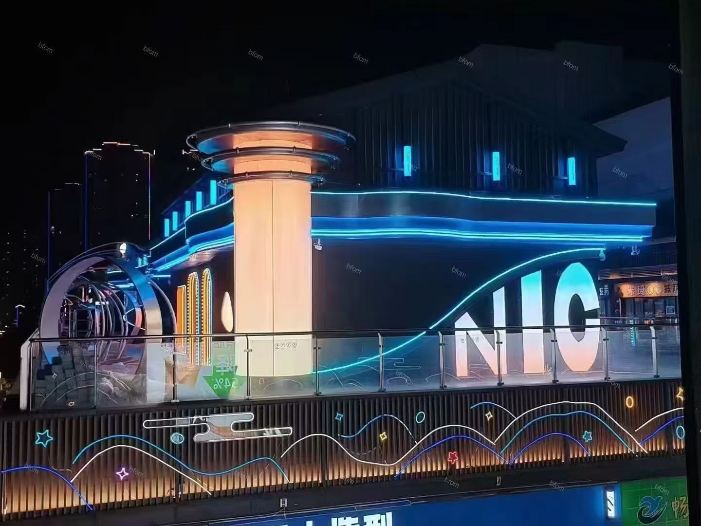 Illuminated commercial signage and exterior lighting.
